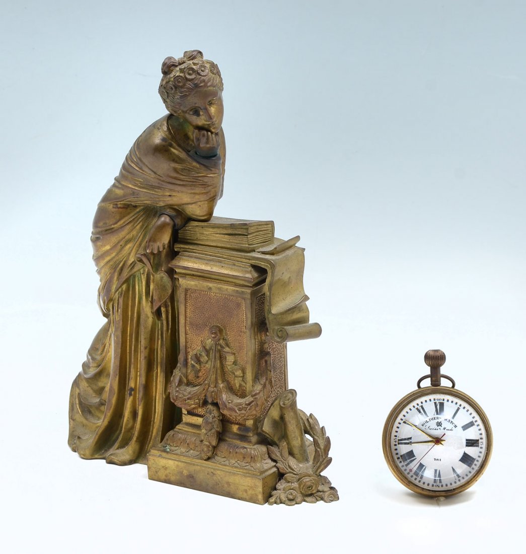 SOLDIERS WATCH & BRONZE FIGURAL CLOCK TOPPER: SOLDIERS WATCH & BRONZE FIGURAL CLOCK TOPPER: 17- Jewel Swiss made ball form Soldier's Watch & a bronze mantle clock topper in the form of a Woman in thought leaning on a pedestal with book & parchmen