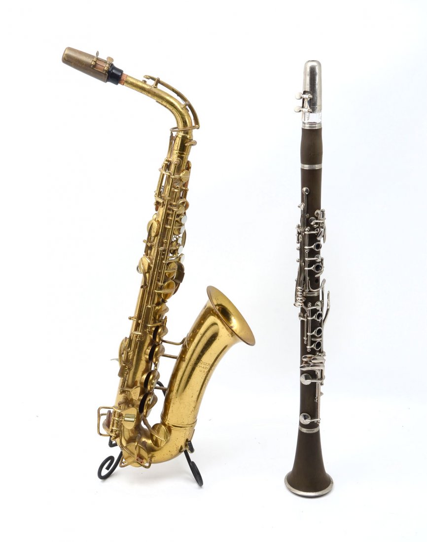2 PIECE LOT OF WIND INSTRUMENTS: 2 PIECE LOT OF WIND INSTRUMENTS: Comprising; 1- Elkhart brass Saxaphone with inset Mother of Pearl. 1- First Act Clarinet, serial #2WAO3514622.