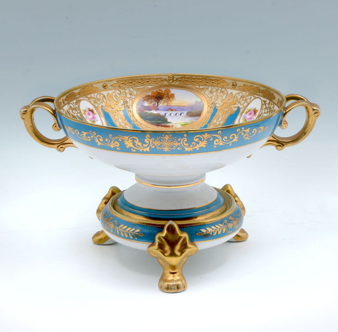 NIPPON PORTRAIT PANEL BOWL: NIPPON PORTRAIT PANEL BOWL: Blue ground Japanese Nippon paneled bowl on a footed pedestal with paw feet. Interior of bawl has waterside painted scenic panels, alternating with floral medallions. Beaut