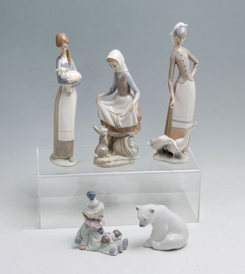5 PIECE LLADRO COLLECTION: 5 PIECE LLADRO COLLECTION: Comprising; 1- Girl with Beach ball & Seashell, 1- Girl crouching with hands on knees, 1- Girl holding hat, 1- Girl holding floral vase, 1- Girl holding floral basket. Large