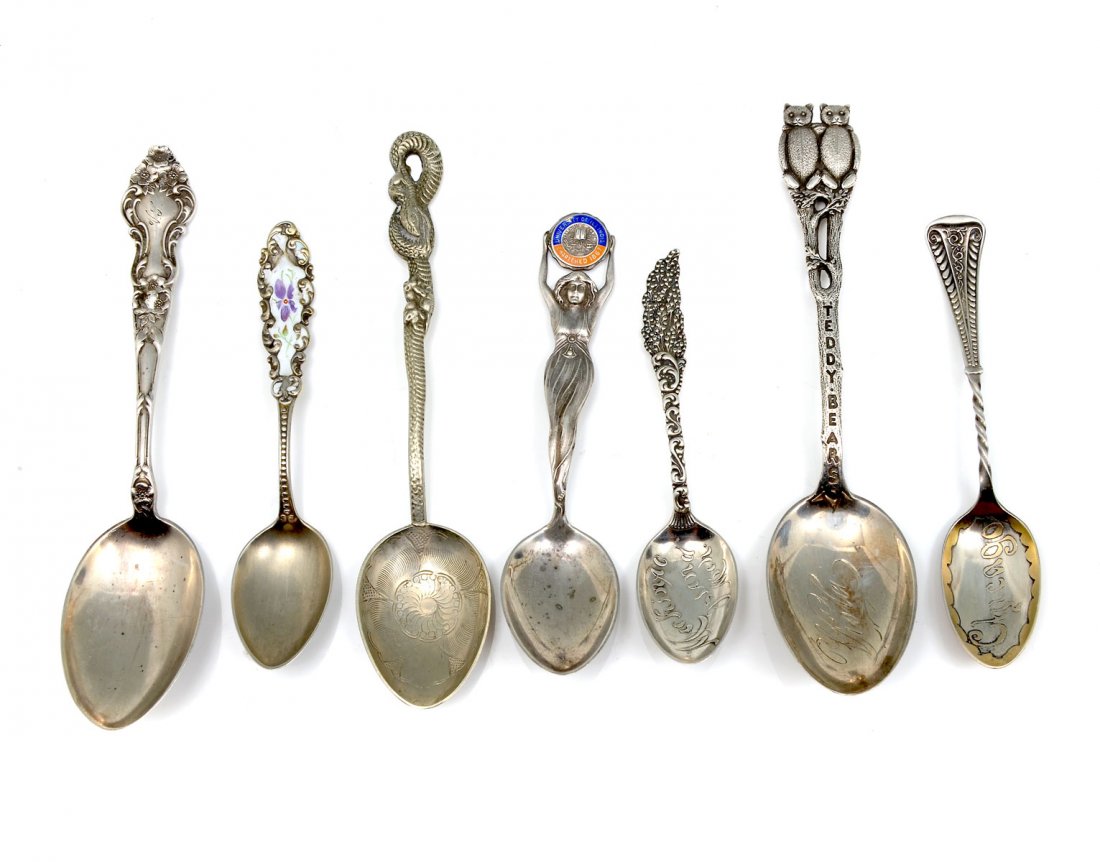 UNUSUAL STERLING SOUVENIR SPOONS: 7 PC LOT OF UNUSUAL STERLING SOUVENIR SPOONS: Approx. 2.5 Troy ounces. Comprising; 1- University of Illinois figural spoon, 2- Watson Co. spoons, 1- English Silver spoon with owls, 1- Japanese spoon w