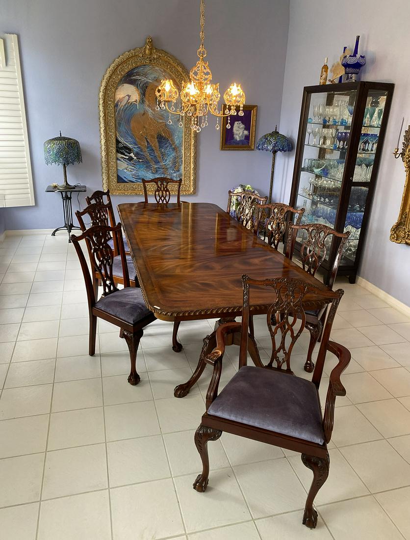 BANDED MAHOGANY CHIPPENDALE STYLE DINING TABLE/8 CHAIRS: BANDED MAHOGANY CHIPPENDALE STYLE DINING TABLE AND 8 CHAIRS: Highly figured mahogany double pedestal claw foot dining table with banded top and scalloped rim. Sold with 8 highly carved Chippendale sty