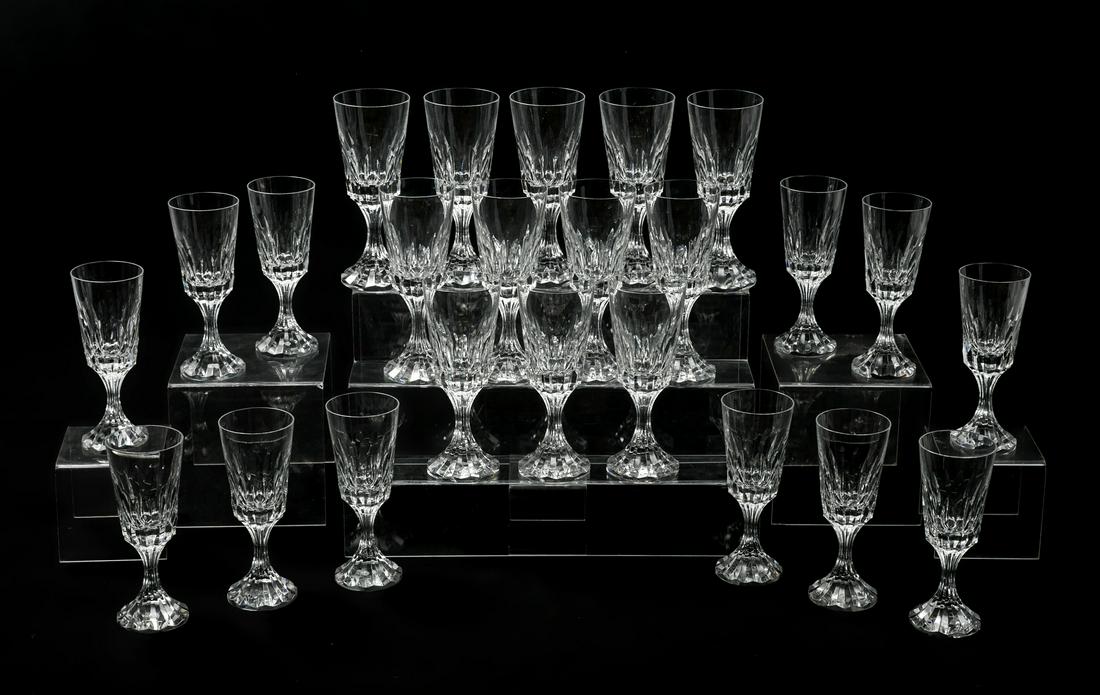 24 PIECE BACCARAT CRYSTAL "D: 24 PIECE BACCARAT CRYSTAL "D'ASSAS" STEMWARE: Comprising; 12- Water glasses & 12- White wine glasses. Etched Baccarat at undersides. Water Approx. 7.75" h x 3". Champagne Approx. 7" h x 2.75" w. 4- Or