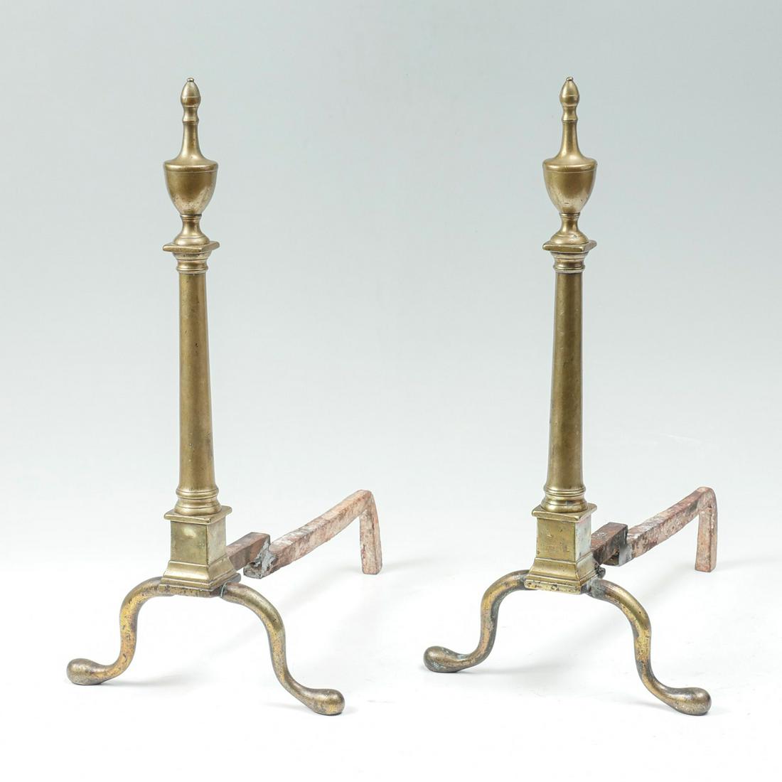PAIR OF AMERICAN FEDERAL BRASS ANDIRONS: PAIR OF AMERICAN FEDERAL BRASS ANDIRONS: 2- American Federal brass andirons, having a surmounting urn. Raised on cabriole legs with Dutch club feet. Approx. 23.5" h x 17.5" l x 11.5" w.