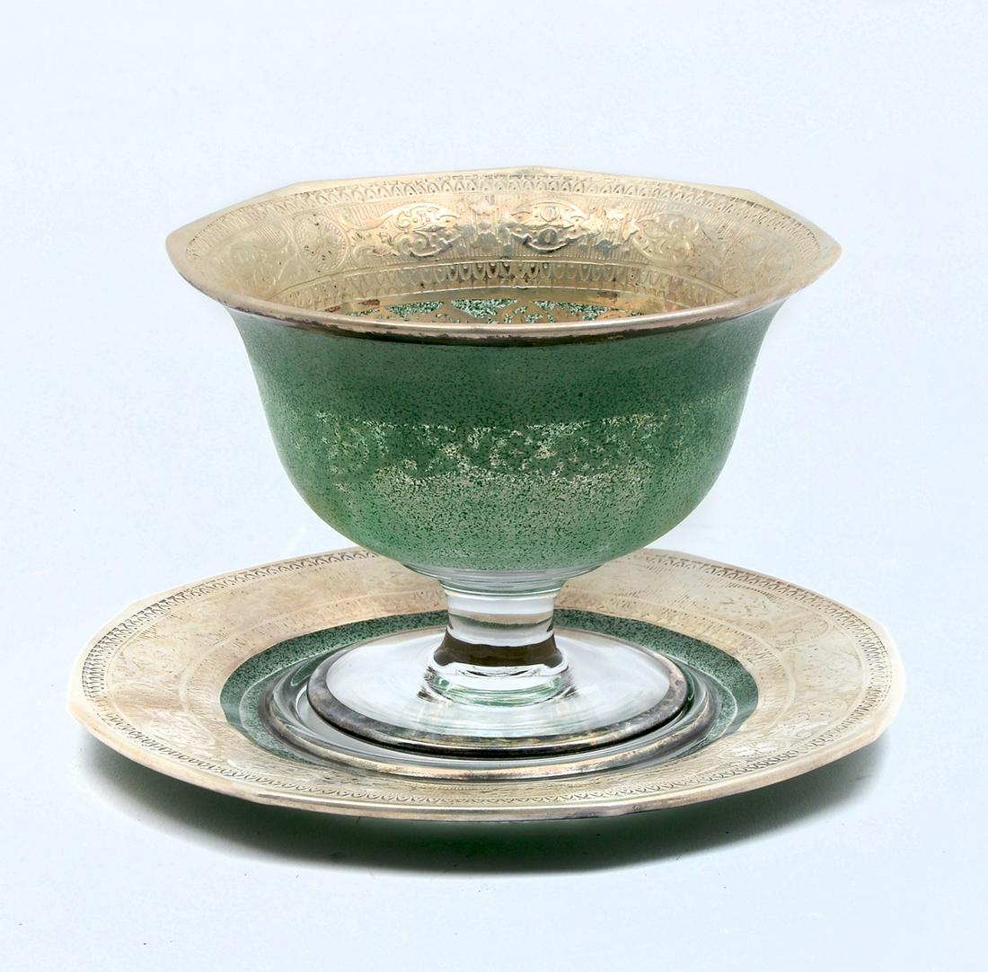 STEUBEN QUALITY SILVER OVERLAY FOOTED BOWL & PLATE: STEUBEN QUALITY SILVER OVERLAY FOOTED BOWL & PLATE: Art nouveau Silver overlay octagonal footed bowl & under plate, having a scrolling foliate & floral medallion design. Exterior of both have a splatt