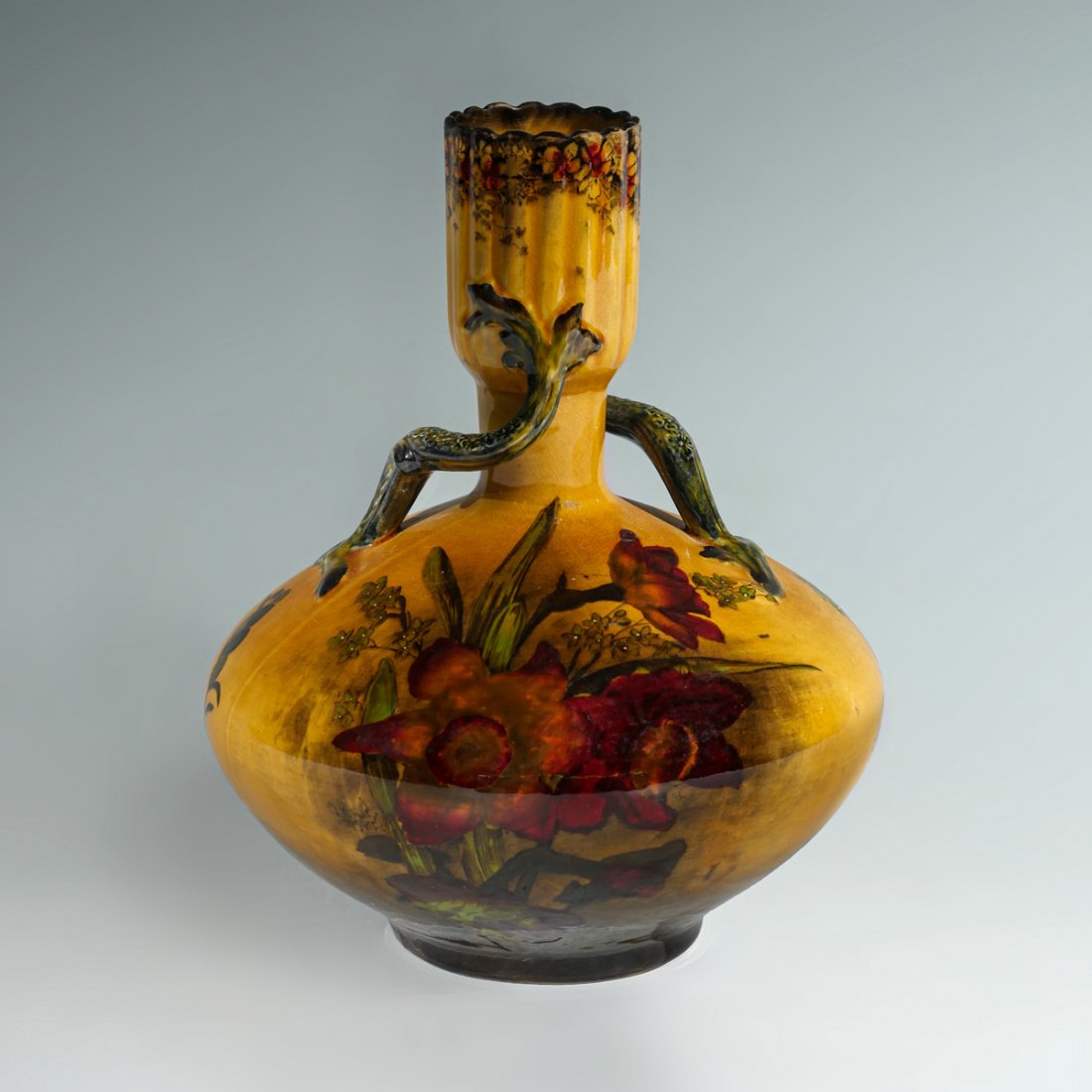 MADRAS WARE DOUBLE HANDLED VASE: MADRAS WARE DOUBLE HANDLED ART NOUVEAU VASE: George Jones & Sons pottery Madras Ware Art Nouveau two handle vase and cover, circa 1900, the body of ochre colour decorated with flowers, flanked by foli