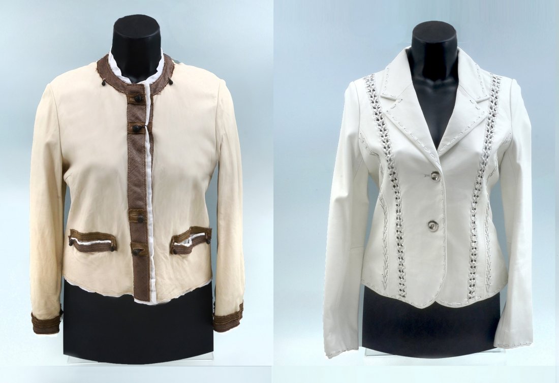 2 LADIES LEATHER FASHION JACKETS: 2 LADIES LEATHER FASHION JACKETS: 1) Opipix handmade French vanilla leather jacket with white linen lining and dark brown burlap trim. 2 front slit pockets. Unique accent buttons. Tags still on the ga
