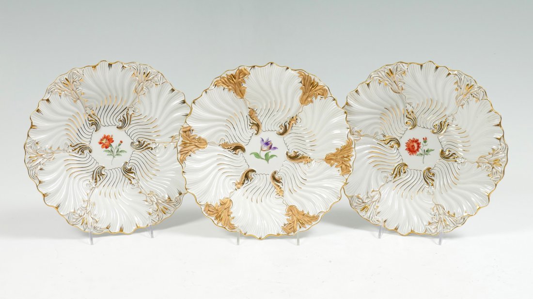 3 MEISSEN PORCELAIN BOWLS: 3 MEISSEN PORCELAIN BOWLS: 3- Porcelain floriform bowls with hand-painted floral medallions in center. Gold painted accenting. Undersides reveals Blue crossed sword mark. Approx. 2.25" h x 11" w.