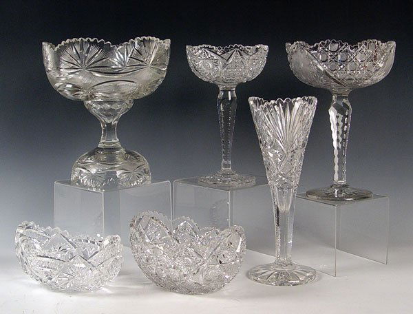 6 PIECE AMERICAN BRILLIANT CUT GLASS COLLECTION: 6 PIECE AMERICAN BRILLIANT CUT GLASS COLLECTION: Assorted patterns to include 1) Fruit bowl, 4" x 8 3/4" x 5". 2) Fruit bowl, note 2 teeth chips, 4 1/2" high x 8 1/2" x 5 5/8". 3) Compote, note missin