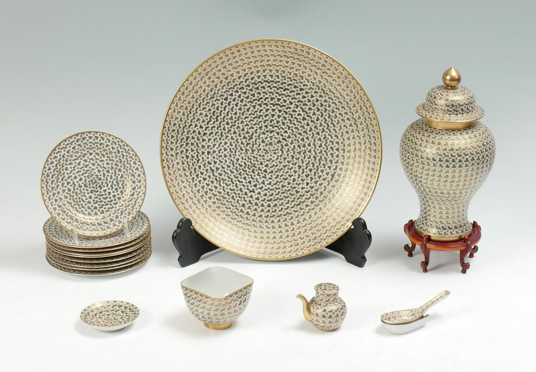 17 PC. MID 20TH C. JAPANESE KUTANI "THOUSAND FLOWER": 17 PC. MID 20TH C. JAPANESE KUTANI "THOUSAND FLOWER" PORCELAIN: Comprising; 1- Large charger, 1- Covered urn, 10- Bread plates, 2 pc. Spoon & Underplate, 1- Covered creamer, 1- Square bowl, & 1- Trink