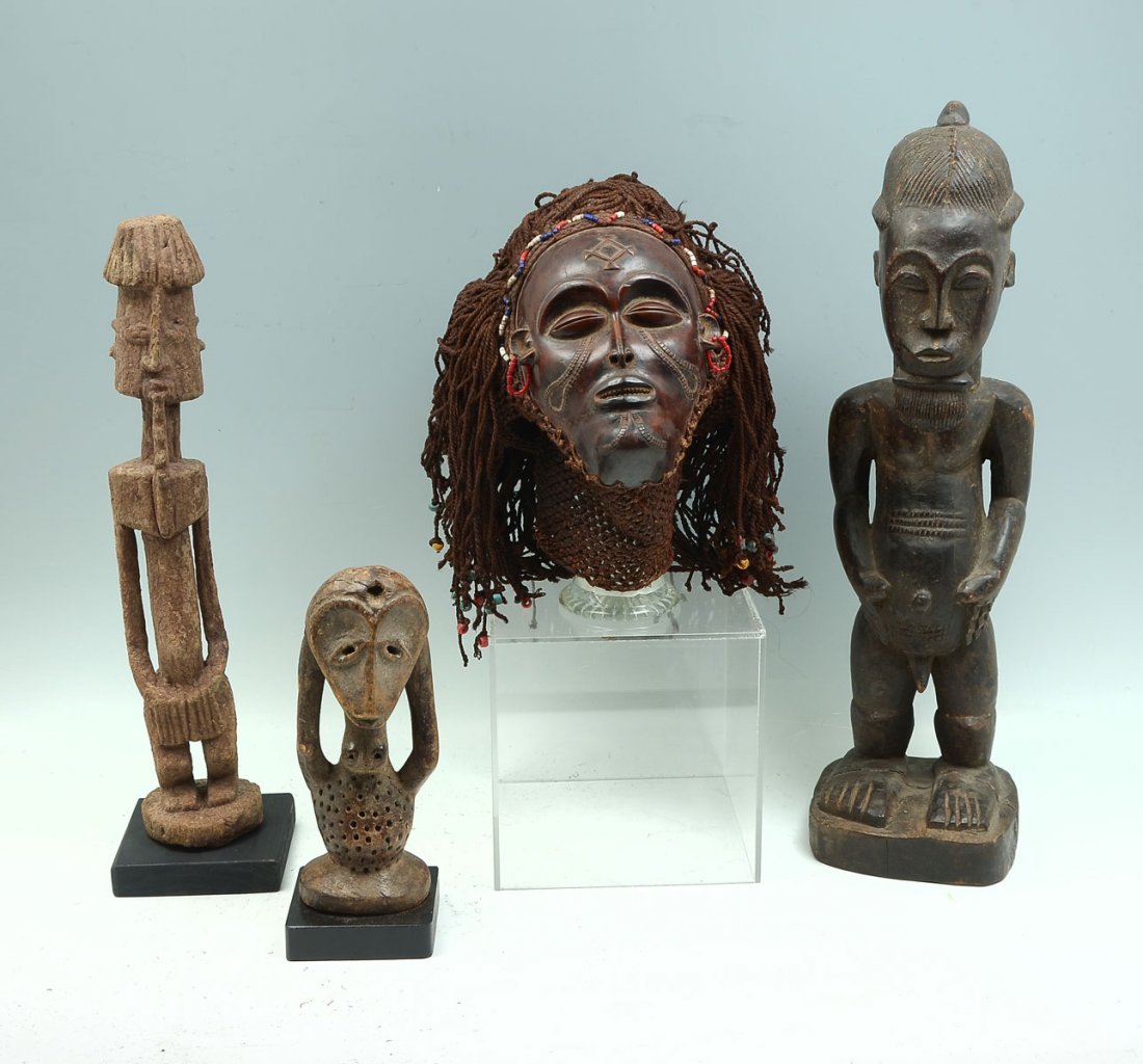 4 PIECE AFRICAN CARVED ART COLLECTION: 4 PIECE AFRICAN CARVED ART COLLECTION: Comprising; 3- carved standing figures. 2 0f 3 are mounted on black bases. 1- Ritual mask, having attached beads, rope with beads as hair, & a mesh neck. Largest