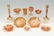 12 PC ORANGE CARNIVAL GLASS COLLECTION