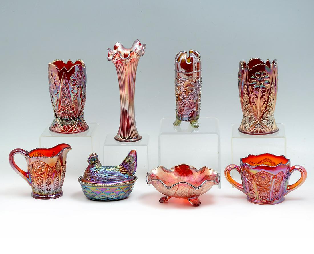 8 PC. RED CARNIVAL GLASS COLLECTION: 8 PC. RED CARNIVAL GLASS COLLECTION:1) Paneled Daisy Indiana Iridescent Red Sunset Cream (4.5" h) & Sugar (3.75" h) Set; 2) Northwood Red Hat Pin Vase Grape & Cable Pattern, 7.25" h; 3) Imperial 3 Foo