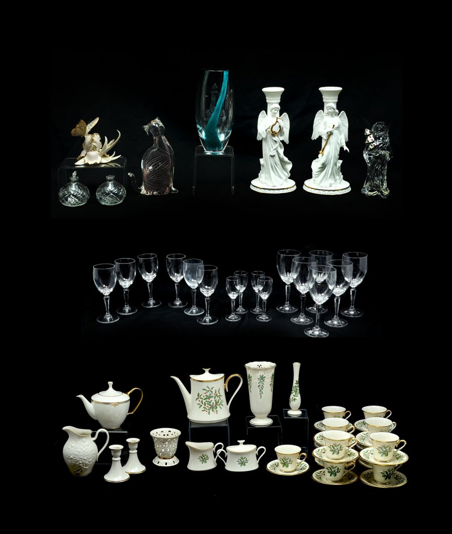 LENOX HOLIDAY CHINA & GLASS COLLECTION: LENOX HOLIDAY CHINA & GLASS COLLECTION: A Large collection of Lenox Holiday china, 16 pc. Stemware collection, Crystal Santa, and Much More. Largest Approx. 8.5" h x 4.5" w.
