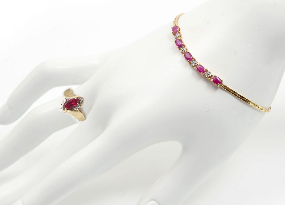 2 PC 10K DIAMOND & RUBY BRACELET & SPINEL RING: 2 PC 10K RUBY BRACELET & SPINEL RING: 1) 10K yellow gold bracelet contains 4 round single cut diamonds. WEIGHT: .02 Ct. Approx. Rated SI in clarity and H-I in color. 5 oval mixed cut rubies. WEIGHT: 1