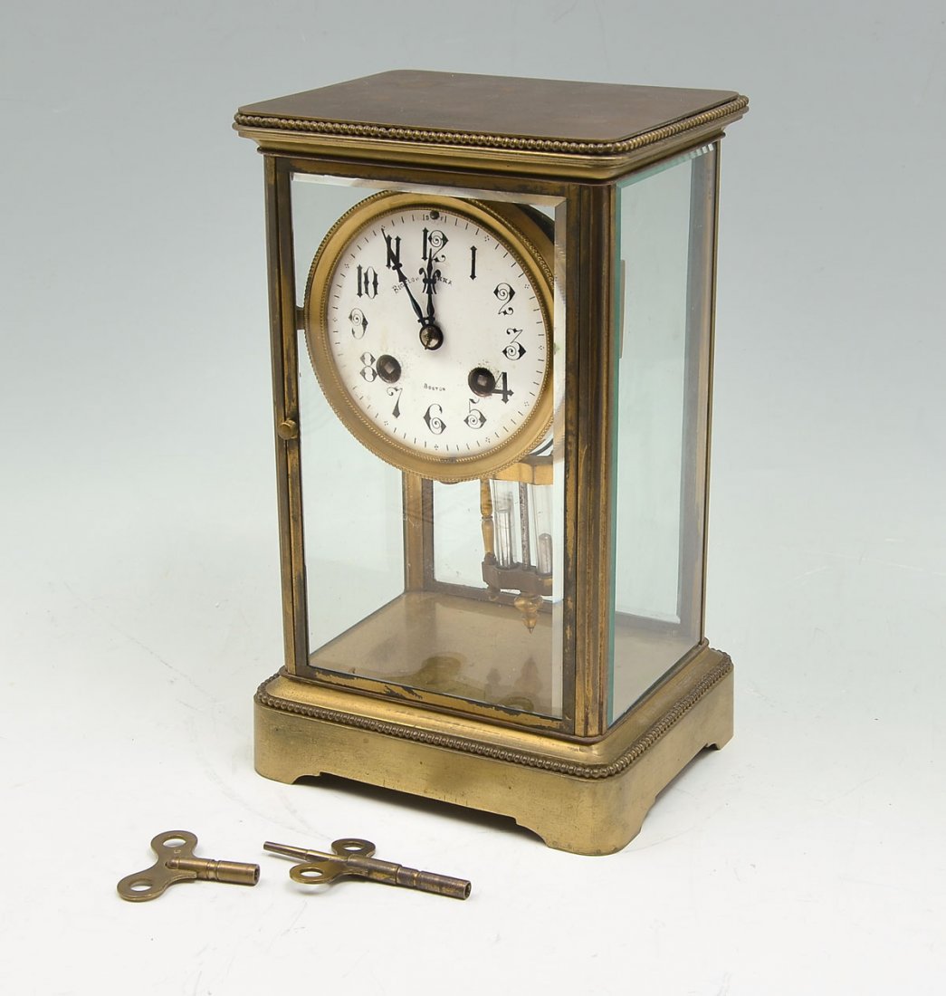 BIGELOW AND KENNARD CARRIAGE CLOCK: BIGELOW KENNARD & CO. CARRIAGE CLOCK: Bigelow Kennard & Co., Boston. Mercury pendulum, with Japy Freres movement. Made in France. 2 Keys included. Approx. 10" h x 6.25" l x 5" w.