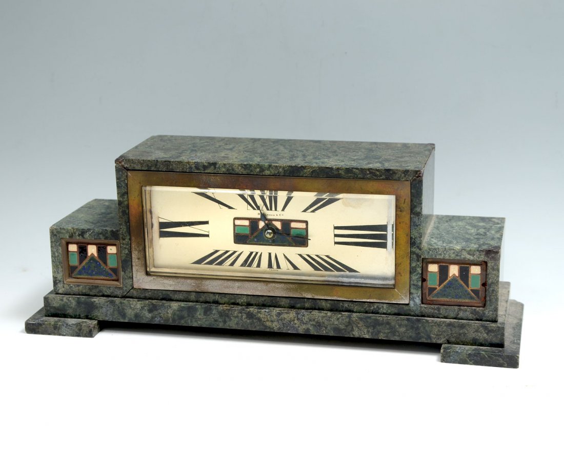ART DECO MARBLE & ENAMELED-COPPER FRENCH MANTLE CLOCK: ART DECO MARBLE & ENAMELED-COPPER FRENCH MANTLE CLOCK: Art deco 13 jewel mantle clock, having a black-spotted green marble frame with enameled-copper plaques flanking rectangular face with Roman chapt