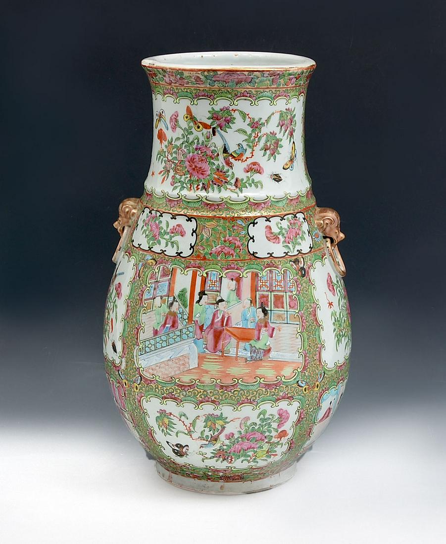 LARGE CHINESE FAMILLE ROSE VASE: LARGE CHINESE FAMILLE ROSE VASE: Large Chinese Rose Medallion vase, having enameled figural scenes and windows with birds, butterflies, & insects amongst floral & foliate. Foo Dog handles with rings i