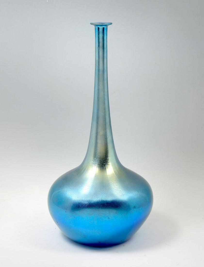 TALL DURAND IRIDESCENT BLUE BOTTLE VASE: TALL DURAND IRIDESCENT BLUE BOTTLE VASE: Circa 1920, iridescent blue bottle vase. Signed, Durand, #1974-18, at underside. Approx. 18.75'' h x 9.5'' w.