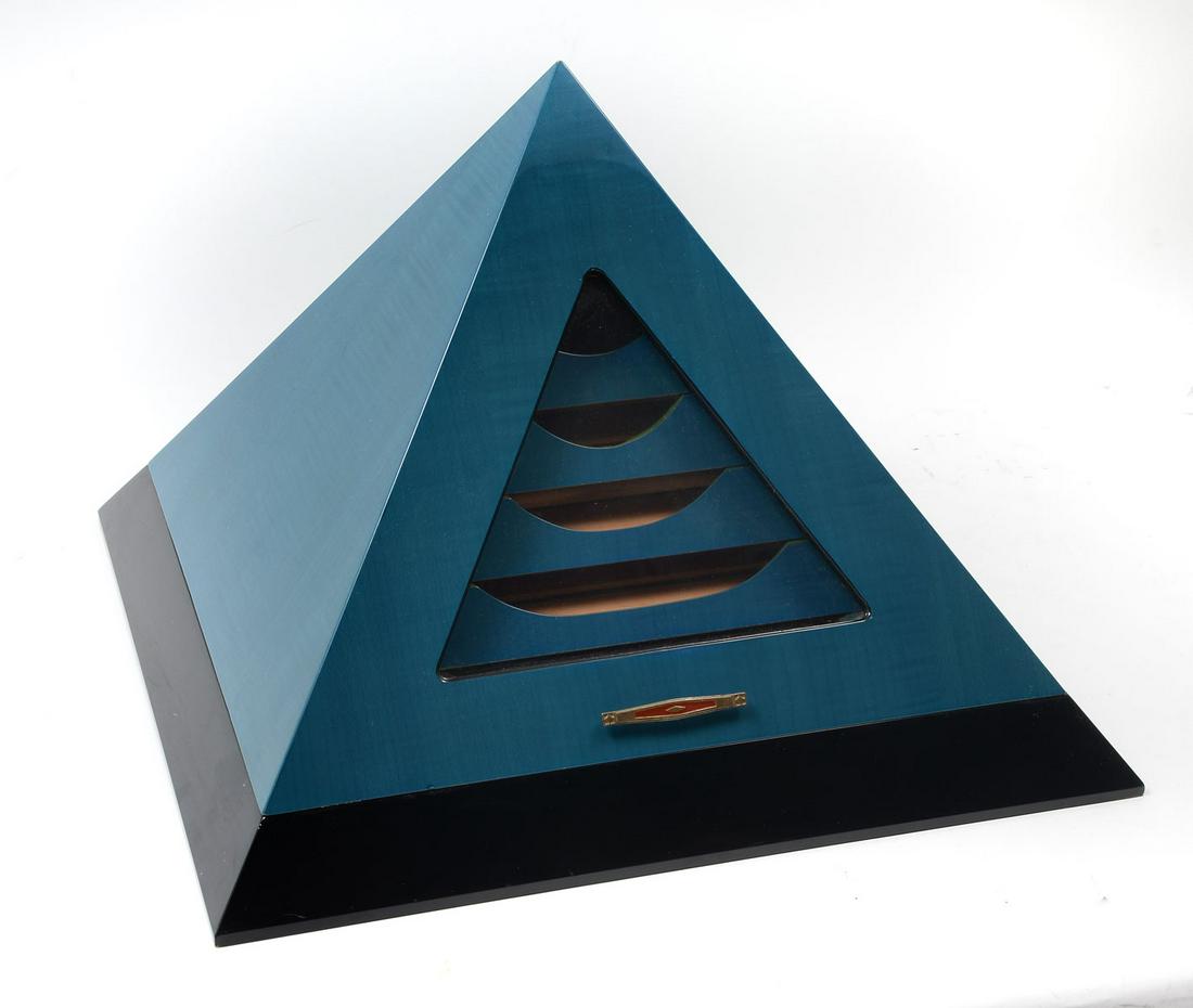 MODERNE MONTE CRISTO CIGAR HUMIDOR: MODERNE MONTE CRISTO CIGAR HUMIDOR: Pyramid form Monte Cristo cigar humidor, having 5- graduated trays. Digital hygro thermometer included. Approx. 12.75'' h x 17.75'' l x 17.75'' w.