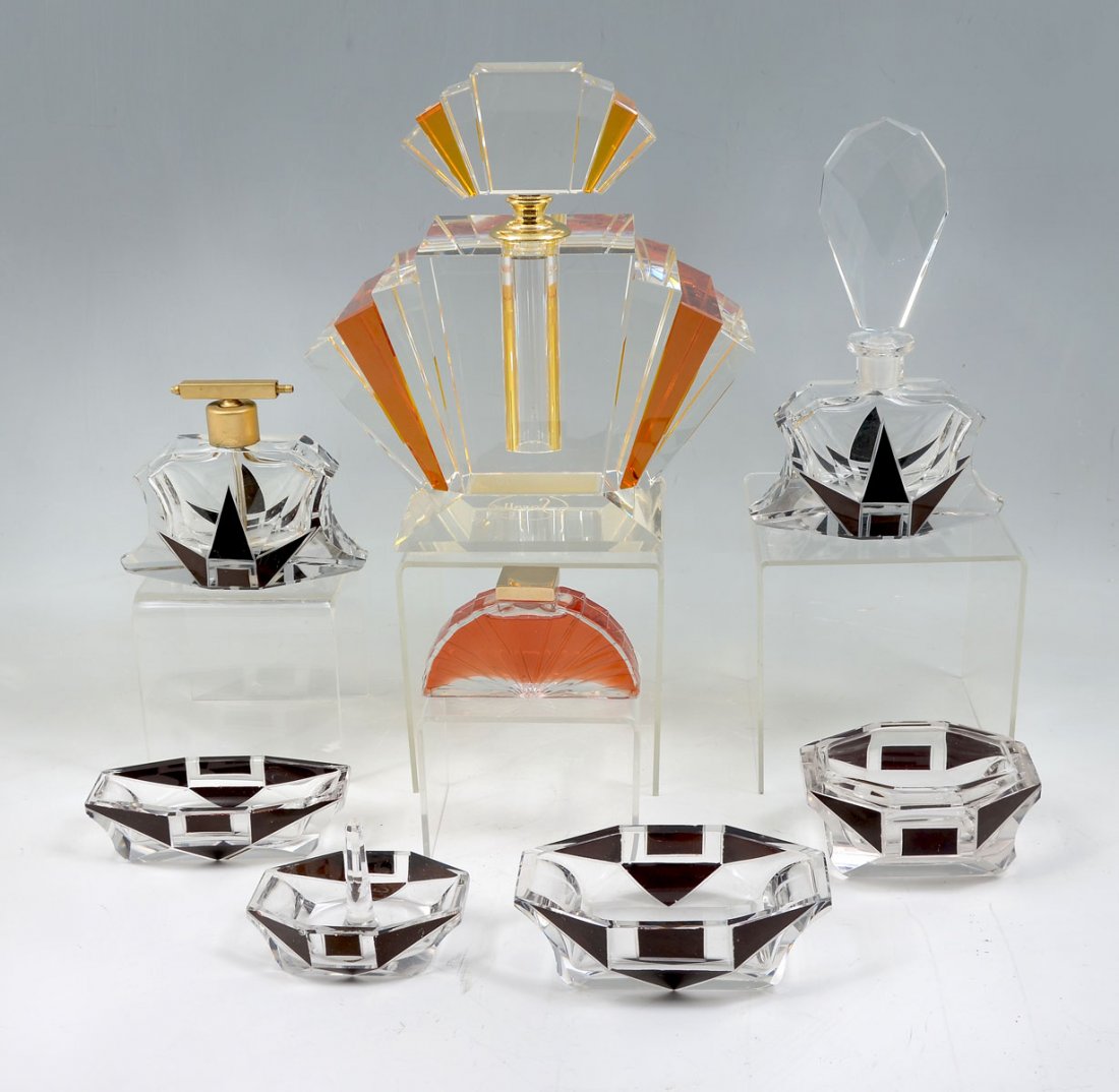 CHIC 8 PIECE ART DECO DRESSER SET: CHIC 8 PIECE ART DECO DRESSER SET: 1) Beautiful clear and gold 8.5" h perfume bottle in the chic Art Deco style of the 1920s with a gorgeous fan shape; 2) 6 piece clear and black art deco vanity set i