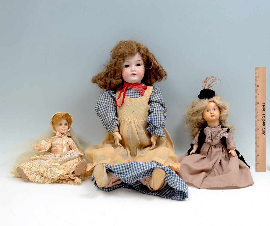 3 BISQUE DOLL COLLECTION: 3 BISQUE DOLL COLLECTION: Comprising; 1- Effanbee Bride doll, signed at verso between shoulders, moving eyes. 1- French style bisque doll, marked A-9, at hairline. 1- Large doll, having a porcelain he