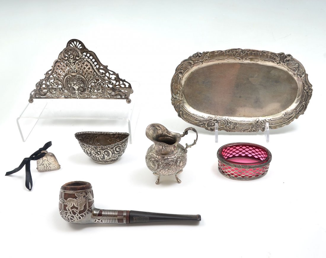 7 PIECE SILVER ITEMS - SOME MARKED 800: 7 PIECE SILVER ITEMS - SOME MARKED 800: 1) Vintage repousse pierce napkin holder marled 800, has 4 ball feet; 2) German repousse 4 footed creamer has lovely scroll work and is marked 800 with a maker'