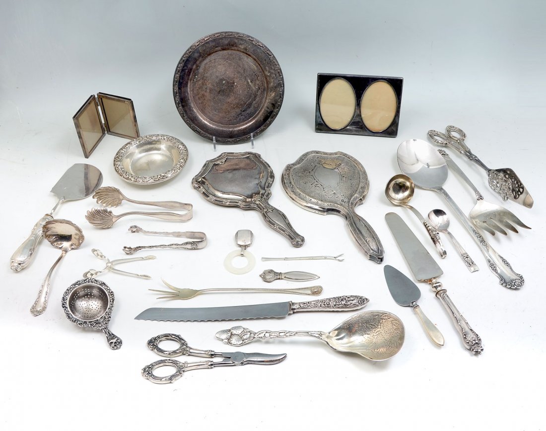 25 PC. STERLING & SILVER PLATE COLLECTION: 25 PC. STERLING & SILVER PLATE COLLECTION: Approx. 24.59 Troy ounces: Comprised of makers such as; Whiting, Georg Jensen, S. Kirk & Son, Gorham, and more. Largest approx. 12.5" l x 3.25" w.