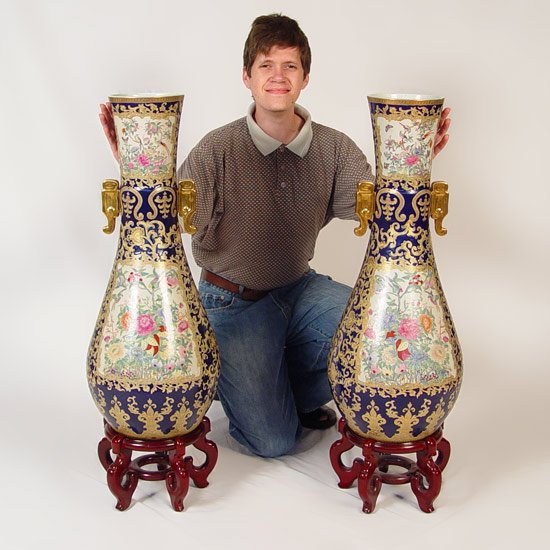 PAIR DECORATIVE CHINESE POLYCHROME FLOOR VASES: PAIR DECORATIVE CHINESE POLYCHROME FLOOR VASES: Vases measures 31 1/2" high x 13" dia. Wood bases measures 7 1/2" high x 11 1/2" dia.