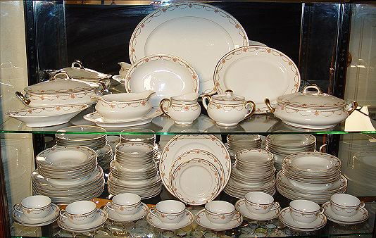 87 pc FRENCH LIMOGES CHINA SERVICE: FRENCH LIMOGES CHINA SERVICE: Bernardaud & Co, Ca. 1900-1914. Approx. 87 pieces to include 2 platters (15 1/2" and 11 1/4"), 2 covered vegetable, 1 open vegetable, relish dish, gravy, creamer and suga