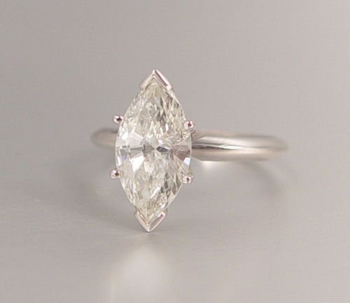 2.36 CT MARQUIS DIAMOND ENGAGEMENT RING : SPARKING 2.36 CT MARQUIS DIAMOND SOLITAIRE RING: 14K white gold engagement ring with an approx. 2.36 Ct solitaire marquis cut diamond, H color, I1 in clarity. Size 6. Weight of 3 grams. Sold with curr