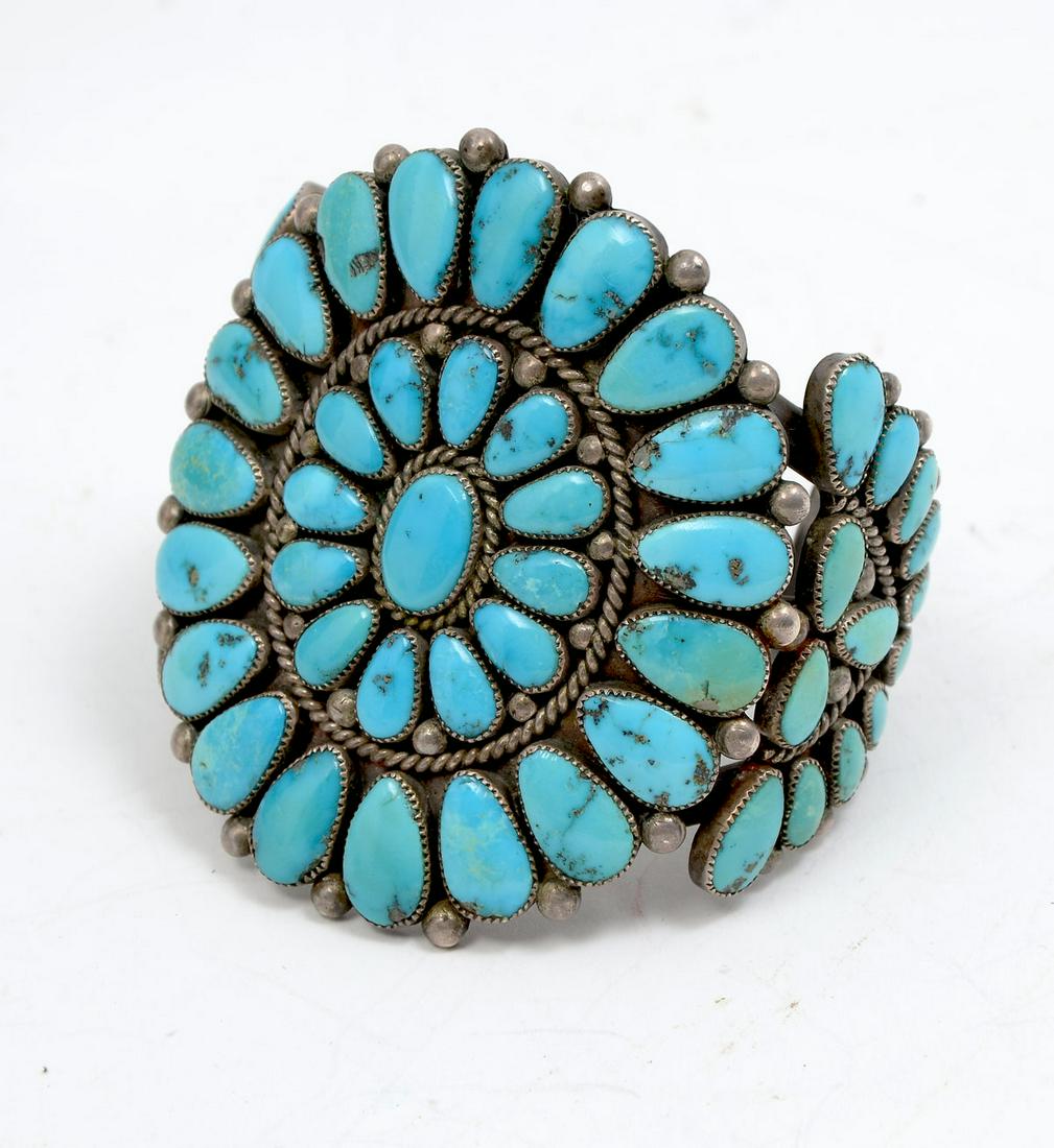 NATIVE AMERICAN OLD PAWN SILVER & TURQUOISE BRACELET: NATIVE AMERICAN OLD PAWN SILVER & TURQUOISE CLUSTER BRACELET SIGNED ALICE QUAM: Navajo old pawn silver and turquoise petit pon cluster bracelet signed A.Q. (Alice Quam). Center piece measures 3" diame