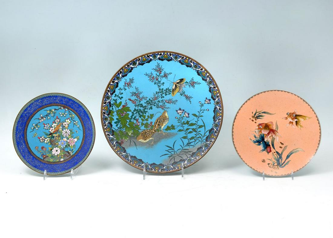 3 JAPANESE MEIJI PERIOD CLOISONNE PLATES & CHARGER: 3 JAPANESE MEIJI PERIOD CLOISONNE PLATES & CHARGER: Comprising; 1- Plate, having a Phoenix perched on a boulder with Ginbari accents and floral design. 1- Peach toned plate with Koi fish & pond foliat
