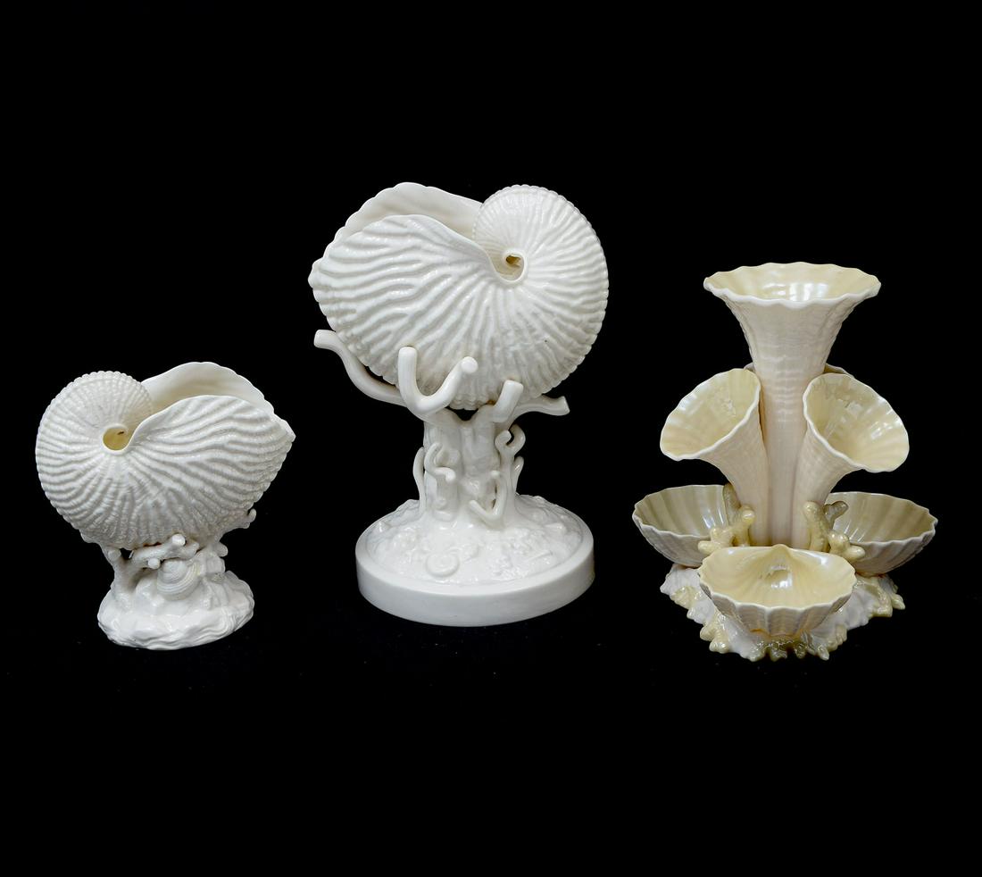 3 PIECE SHELL MOTIF BELLEEK: 3 PIECE SHELL MOTIF BELLEEK: 1) Vintage Belleek Marine Epergne vase with the 5th green mark. Four center trumpets and three shells with coral branches on a coral base. Classic creamy ivory Belleek gla