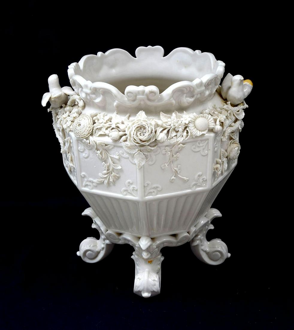 2ND MARK BELLEEK FLORAL PANELED FOOTED FLOWERPOT: 2ND MARK BELLEEK FLORAL PANELED FOOTED FLOWERPOT: Similar to the pot offered in the 1988 Horace Manning Mann Belleek auction. This piece measures 11.5'' h with 8'' diameter. 8 panels accented with det
