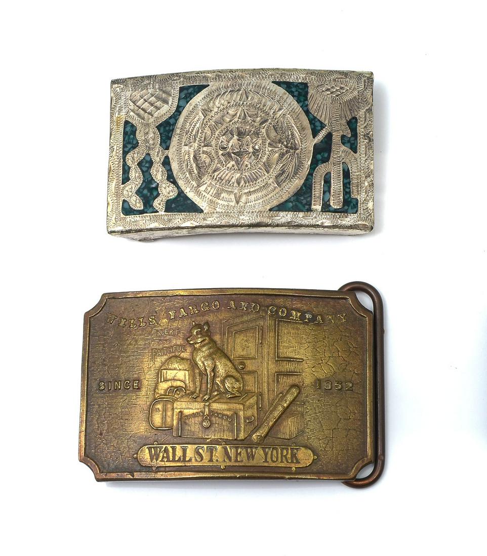 2 BELT BUCKLES INCLUDING TIFFANY: 2 BELT BUCKLES INCLUDING TIFFANY: Comprising; 1- Alpaca silver belt buckle, having crushed turquoise inlay. Incised Mayan calendar flanked by cactus forms. 1- Bronze Tiffany stamped, New York belt buc