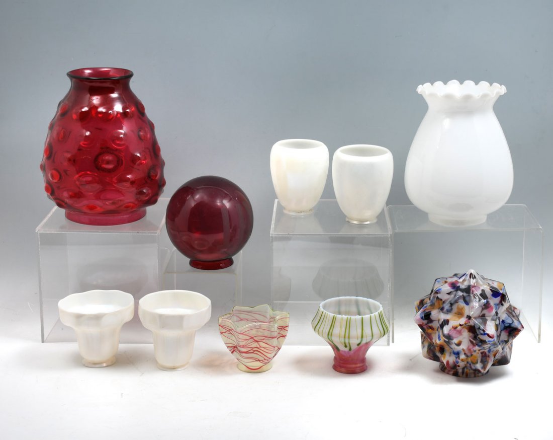 10 PC. LAMP SHADE COLLECTION: 10 PC. LAMP SHADE COLLECTION: Various sized & formed art glass lamp shades. Including vaseline glass, an emergency exit shade, and Steuben style calcite shades. Largest Approx. 9.75'' h x 8'' w.