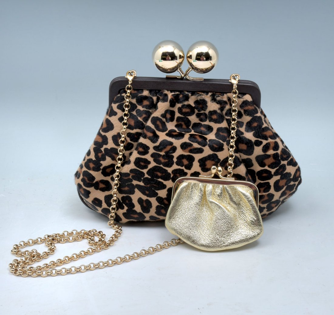 TIFFANY & CO LEOPARD PRINT BAG, FALL 2012: TIFFANY & CO LEOPARD PRINT BAG, FALL 2012: Fun Leopard print bag by Tiffany & Co with blue storage bag. 19" drop chain, gold ball closure with gold change purse tucked in inside pocket.