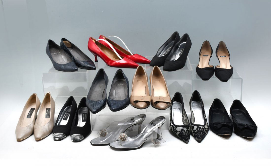 11 PR STUART WEITZMAN SHOES: 11 PR STUART WEITZMAN SHOES: A collection of Stuart Weitzman size 7 shoes varying in style and color. 4 pair black heels (good/very good condition) , 1 pair black flats, 2 pair dark blue faux gator pu