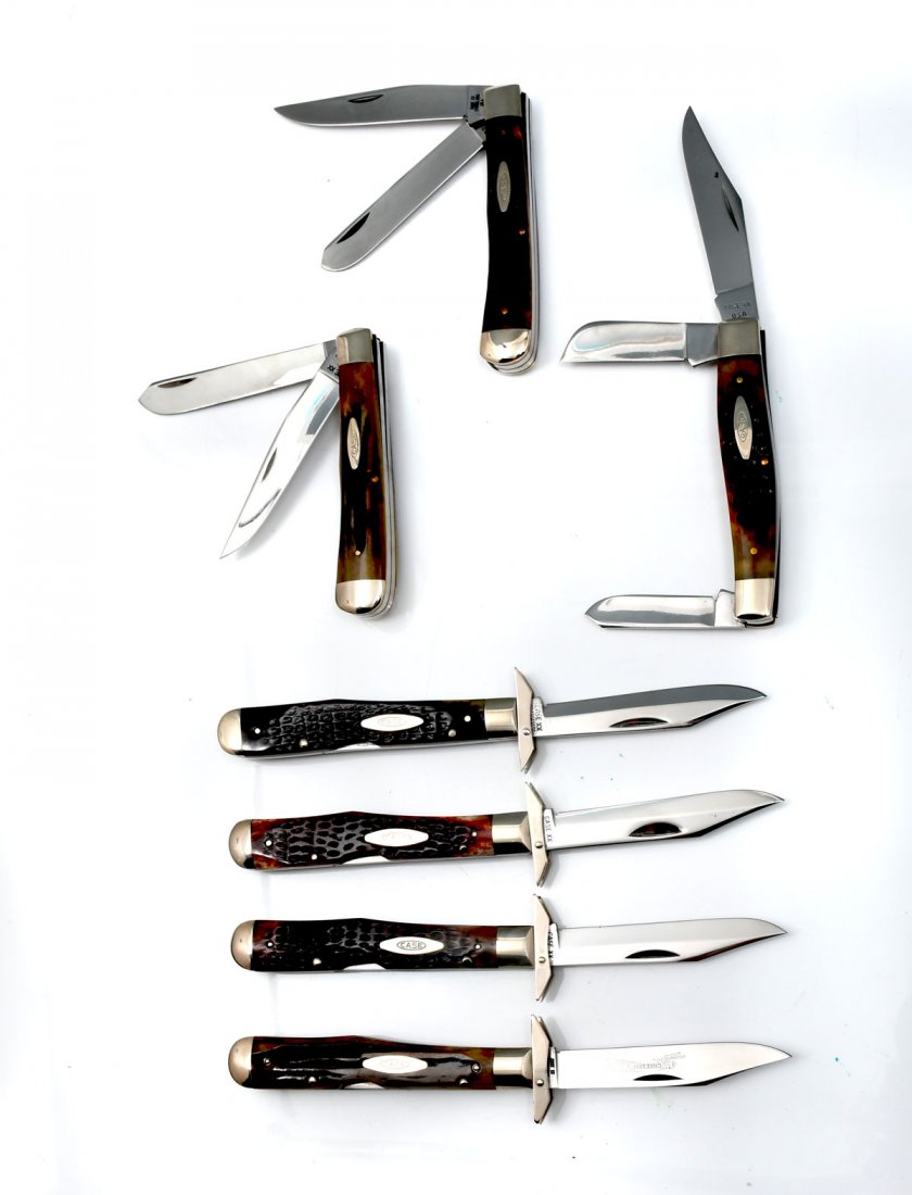 7 PIECE CASE FOLDING KNIFE COLLECTOR LOT: 7 PIECE CASE FOLDING KNIFE COLLECTOR LOT: 1) Case XX Two Blade Folding Pocket Knife model 6254SSP, staghorn handle, unused condition, 7.5" in length; 2) Case XX Model 6375 Three Blade Folding Pocket K