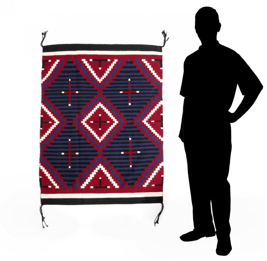 NAVAJO GANADO CHIEF CHILD'S WEARING BLANKET: NAVAJO GANADO CHIEF CHILD'S WEARING BLANKET: Red, white, blue & black blanket measures approx 33" x 45"; cross pattern in red.