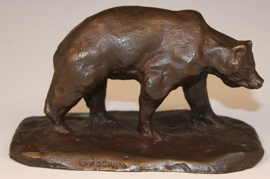 BEAR BRONZE SIGNED GOODWIN: GRIZZLY BEAR BRONZE SIGNED GOODWIN: 2 1/2" x 4", Calhoun's stamped underneath.