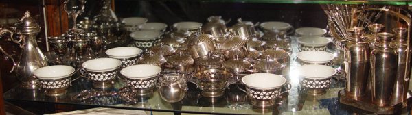 ESTATE COLLECTION SILVERPLATE EGG CUPS ,RAMEKINS: COLLECTION OF SILVER PLATE EGG CUPS, RAMEKINS, FRUIT KNIVES ETC: Approx 47 pieces to include 1) 7 cups with porcelain inserts, note one insert missing. 2 1/4" x 5" dia. 2) 12 Gorham covered ramekins, 