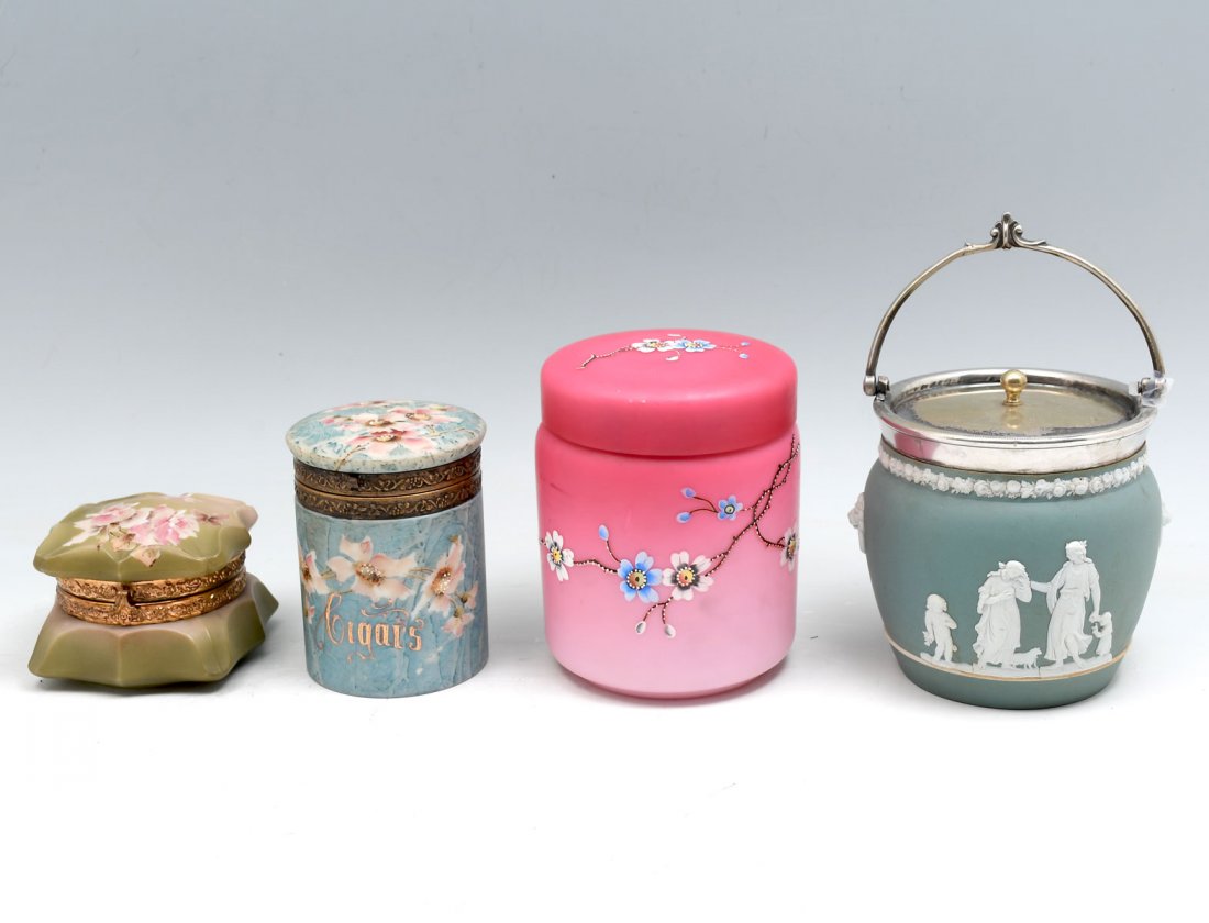 4 PC. DRESSER & BISCUIT JARS: 4 PC. DRESSER & BISCUIT JARS: Comprising; 1- Painted glass Cigar jar, 1- Victorian biscuit jar, 1- Lidded Wedgewood biscuit jar, & 1- Victorian glass dresser jar with silk interior. Largest Approx. 6"