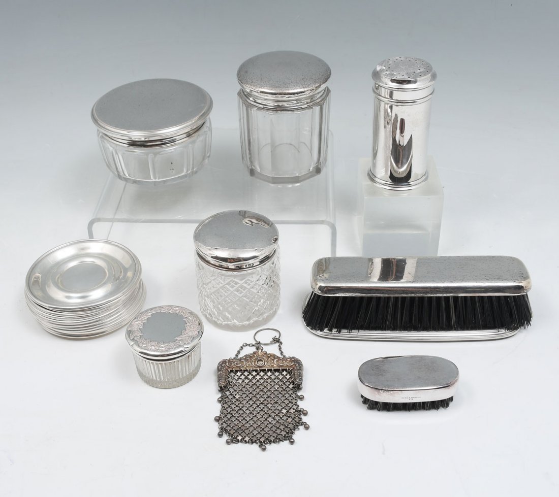 STERLING SILVER VANITY SET: STERLING SILVER VANITY SET: Approx. 15.63 Troy ounces weighable. Comprising; 4- Dresser jars, 1- Tray, 1- Whiting & Davis Silver purse, 1- powder shaker, 2- Brushes, & 12- Coasters. Including Gorham,