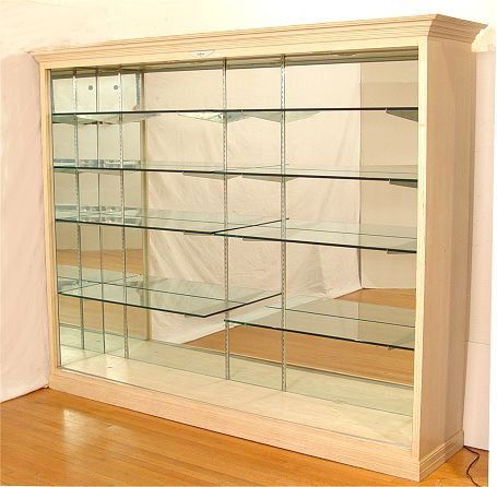 GUERLAIN ILLUMINATED GLASS DISPLAY CABINET: GUERLAIN COMMERCIAL ILLUMINATED GLASS DISPLAY CABINET: Adjustable glass shelves. Measures 77 3/4" h. x 98 1/4" x 22".