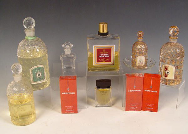 GUERLAIN PERFUME & GLASS BOTTLE COLLECTION: GUERLAIN PERFUME & GLASS BOTTLE COLLECTION: 10 piece group to include 4 Guerlain Imperial bottles and contents 6 1/2 - 11 1/2". and 3 unopened Heritage bottles, 3.4 oz.