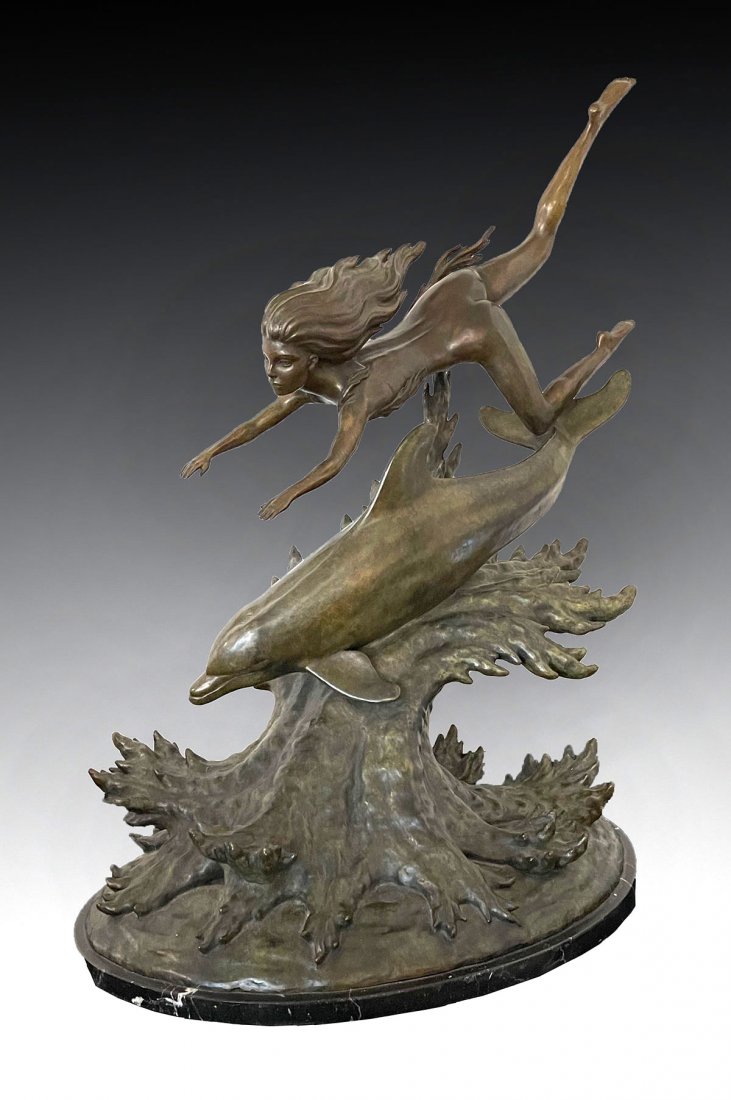 BRUCE REINES BRONZE SCULPTURE OF NUDE MAIDEN: REINES, Ira Bruce, (American, 1957-): Bronze sculpture with Young Nude Beauty Free Diving with Dolphin, approx. 29'' in height by 24'' in width by 15'' in depth, signed, numbered 1/9, dated '79 with a