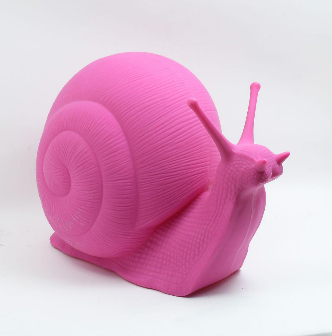 CRACKING ART GROUP RECYCLED PLASTIC PINK SNAIL: CRACKING ART GROUP RECYCLED PLASTIC PINK SNAIL: 16" in height by 21" wide, stamped Cracking Art Group underneath.