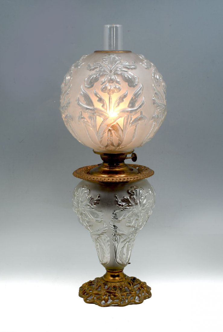 GONE WITH THE WIND CLEAR & SATIN GLASS LAMP: GONE WITH THE WIND CLEAR & SATIN GLASS LAMP: Having an overall Orchid motif. Floral & scrolling foliate designed metal base & collar. Approx. 26" h x 11" w.